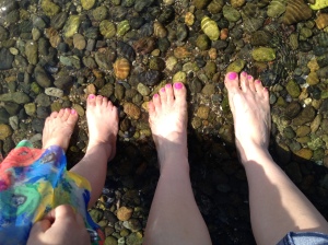 putting our feet in the water at the beach